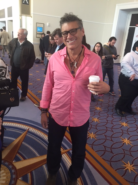 Steven Bauer in a very confident, casual pink shirt. 